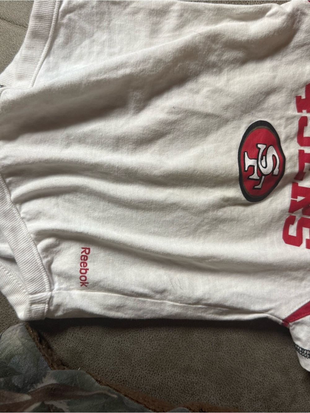 Reebok Men’s White Athletic Shorts with Red Team Logo